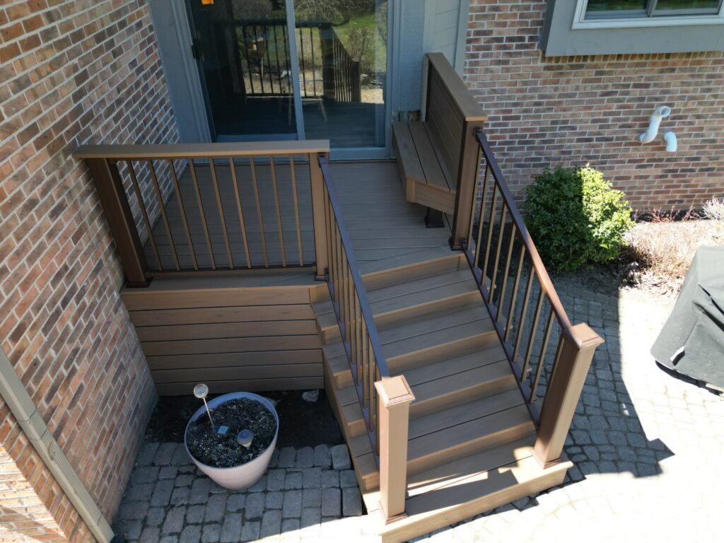 custom trex transcend lineage jasper composite deck with signature aluminum deck railing and built in bench