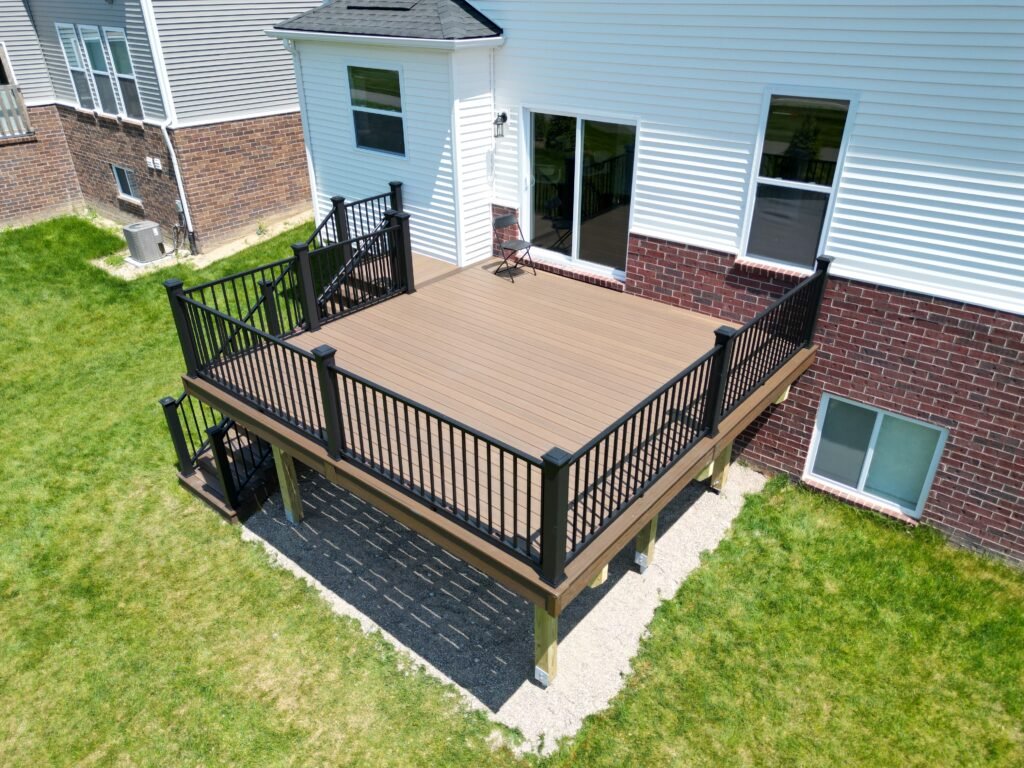 custom trex enhance toasted sand composite deck with signature aluminum deck railing