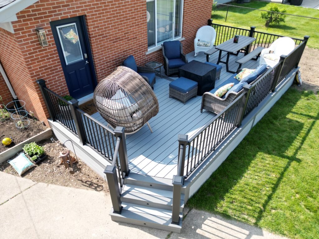custom trex transcend island mist composite deck with signature aluminum deck railing