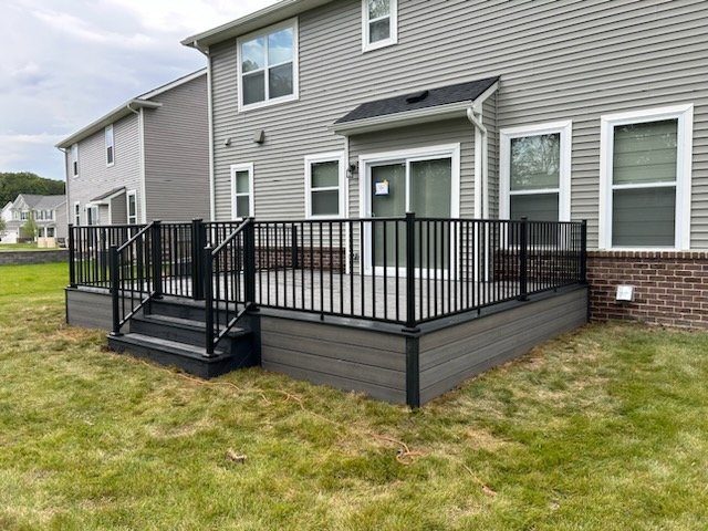 custom deckorators voyage sierra composite deck with signature aluminum deck railing