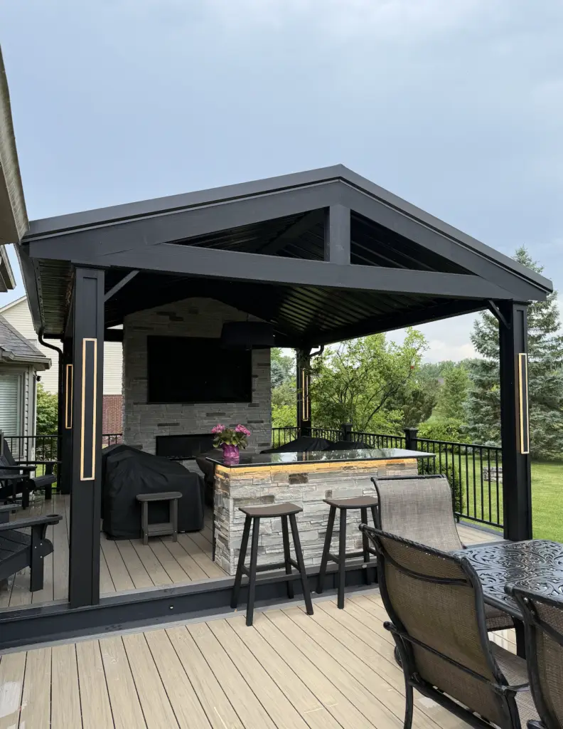 Custom composite trex deck and gazebo with outdoor fireplace and bar top