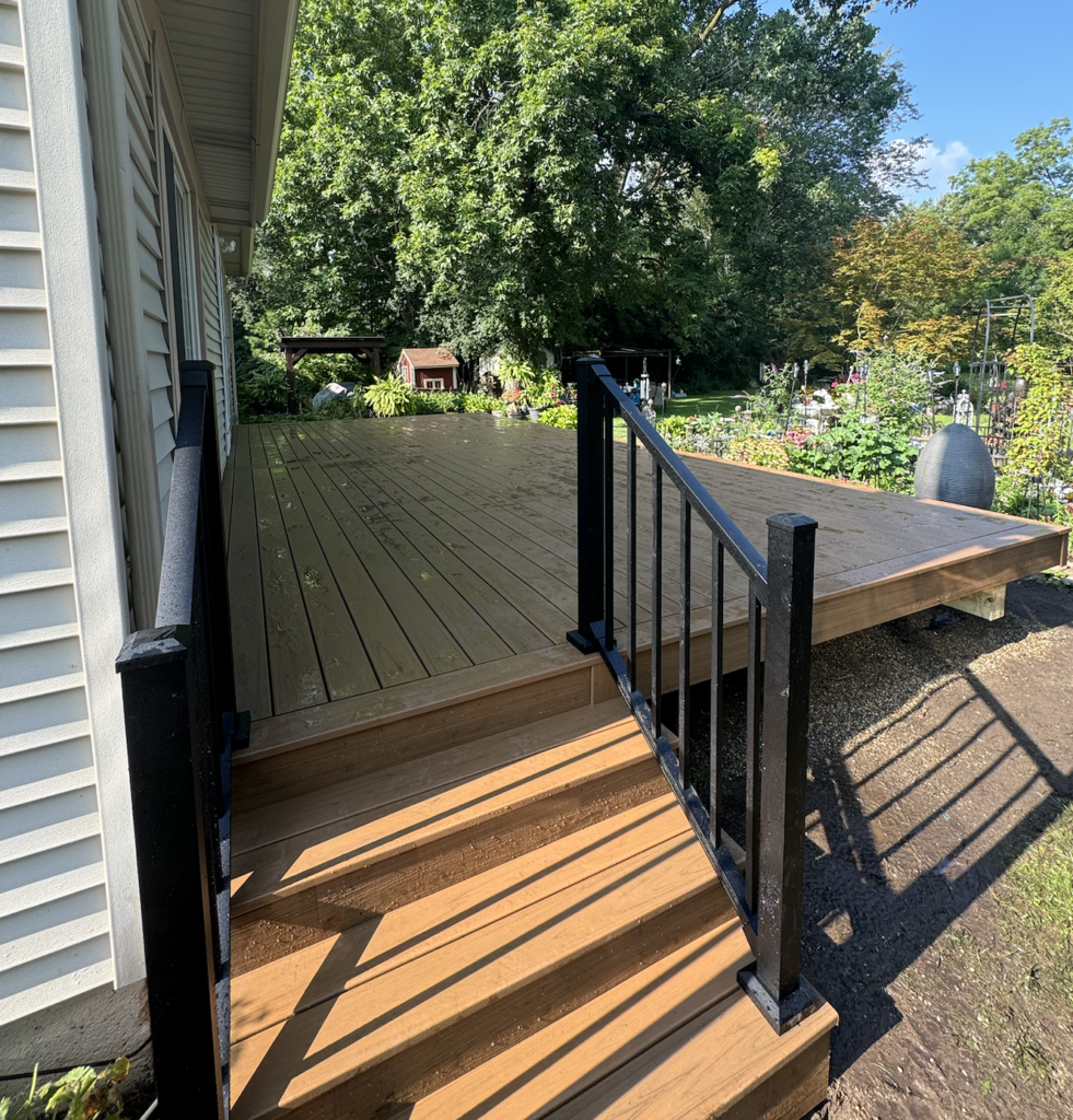 custom trex lineage jasper composite deck with signature aluminum deck railing