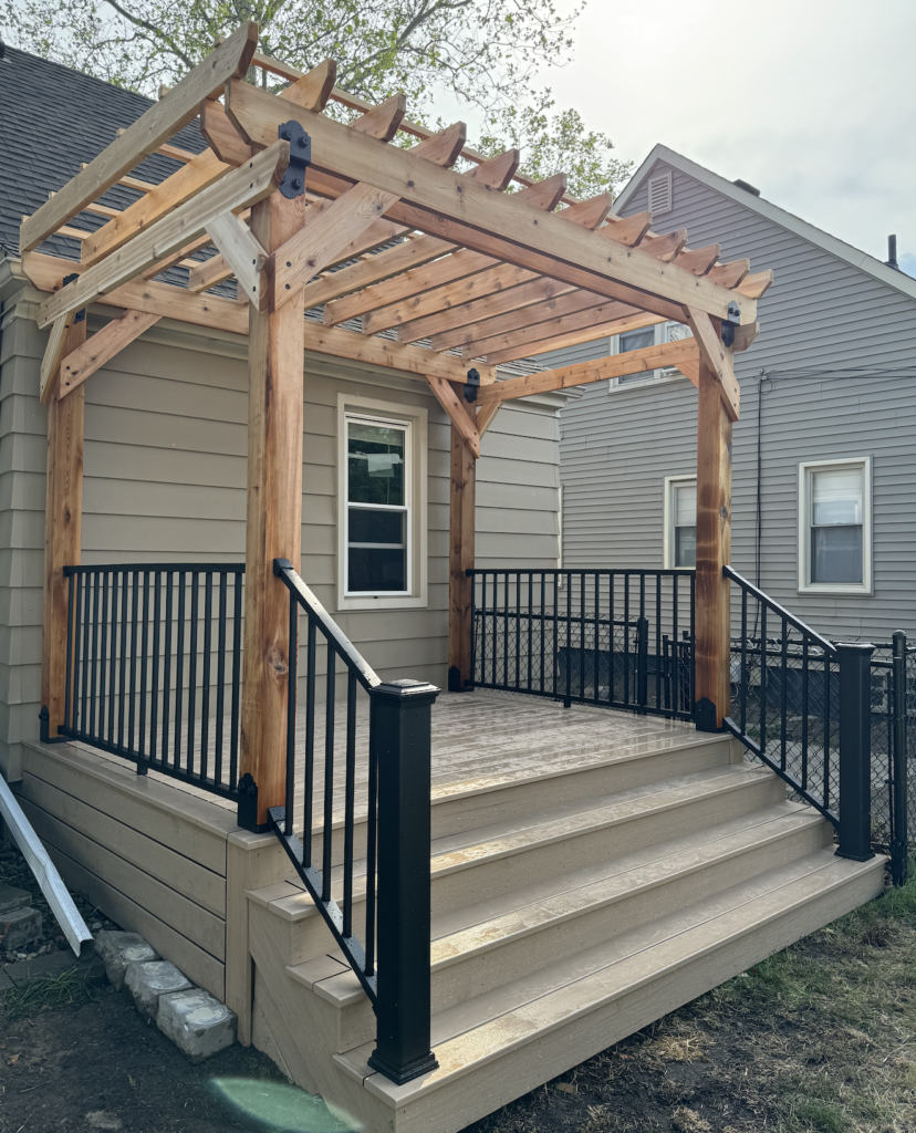 trex lineage carmel composite deck with railing and cedar pergola